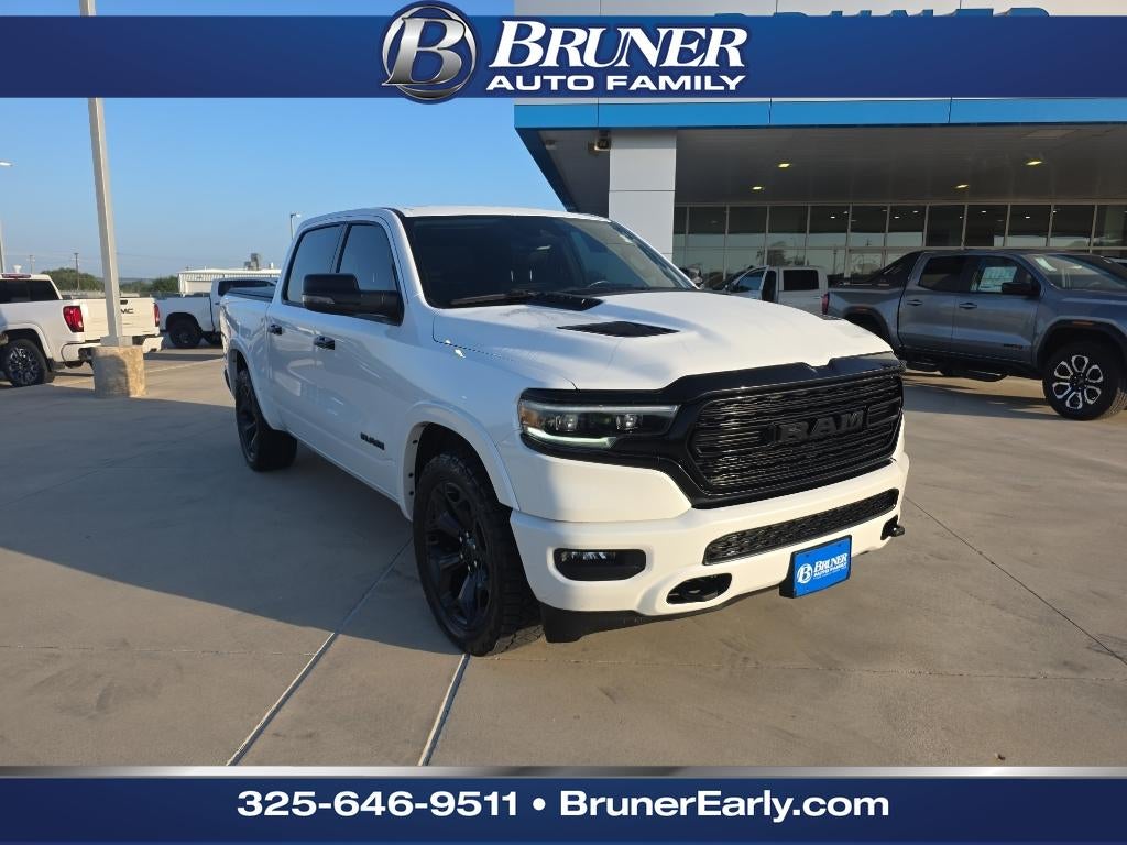 2024 RAM 1500 Limited in Ivory White Tri-Coat Pearlcoat — front three-quarter view
