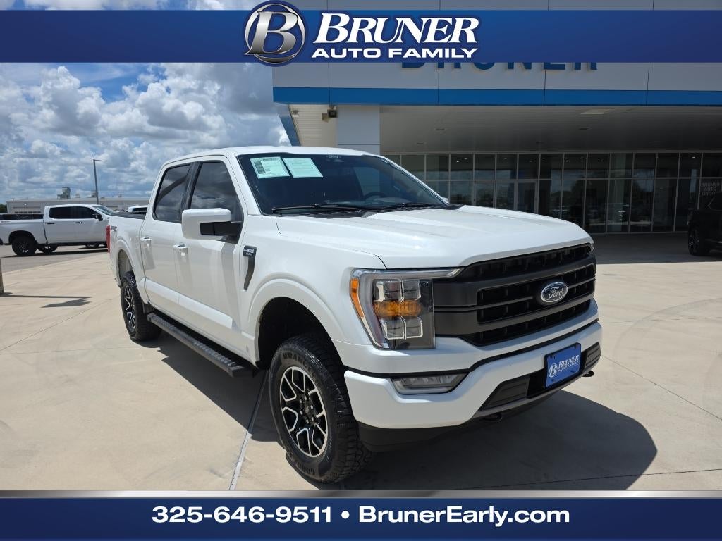 2023 Ford F-150 LARIAT in Star White Metallic Tricoat — front three-quarter view
