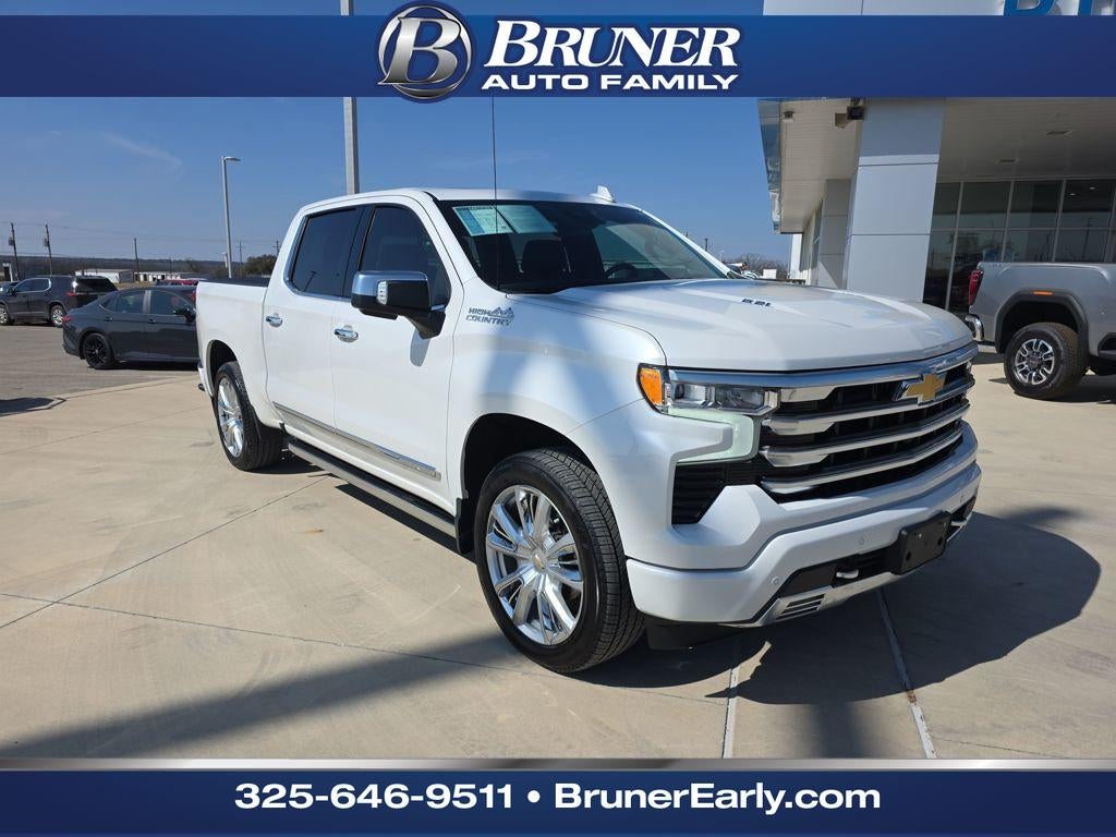 2024 Chevrolet Silverado High Country in Iridescent Pearl Tricoat — front three-quarter view