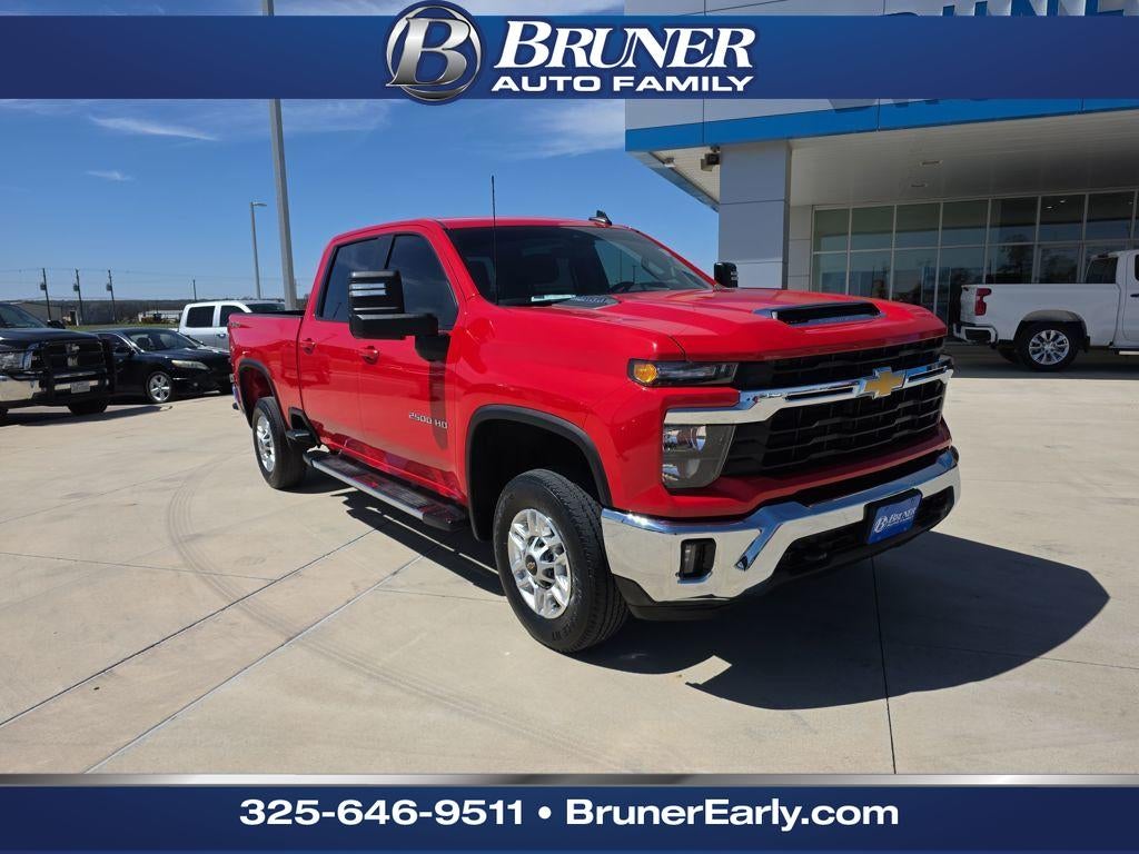 2024 Chevrolet Silverado LT in Red Hot — front three-quarter view