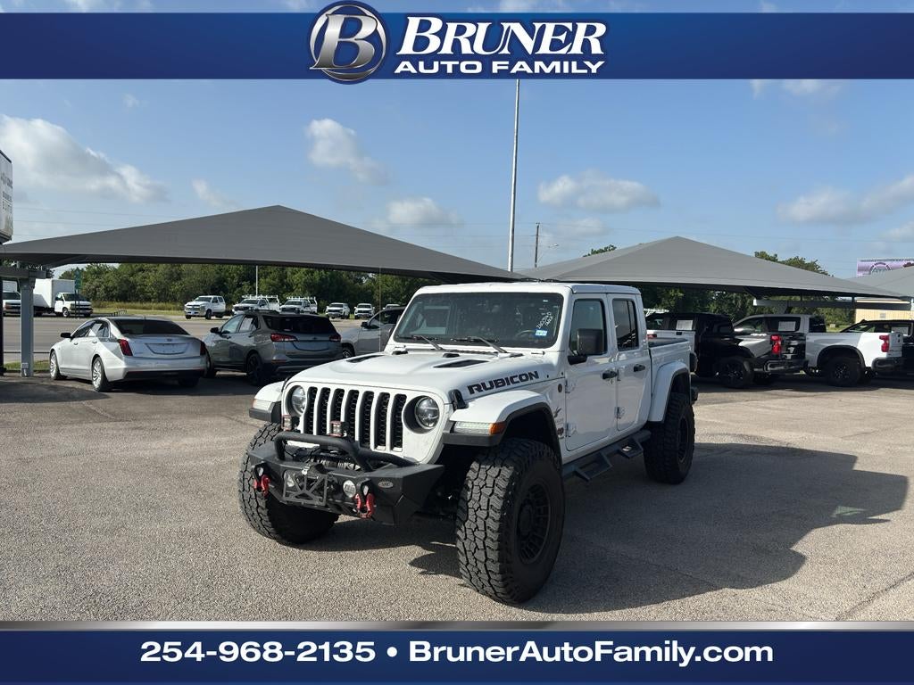 2022 Jeep Gladiator Rubicon 4x4 in Bright White Clearcoat — front three-quarter view