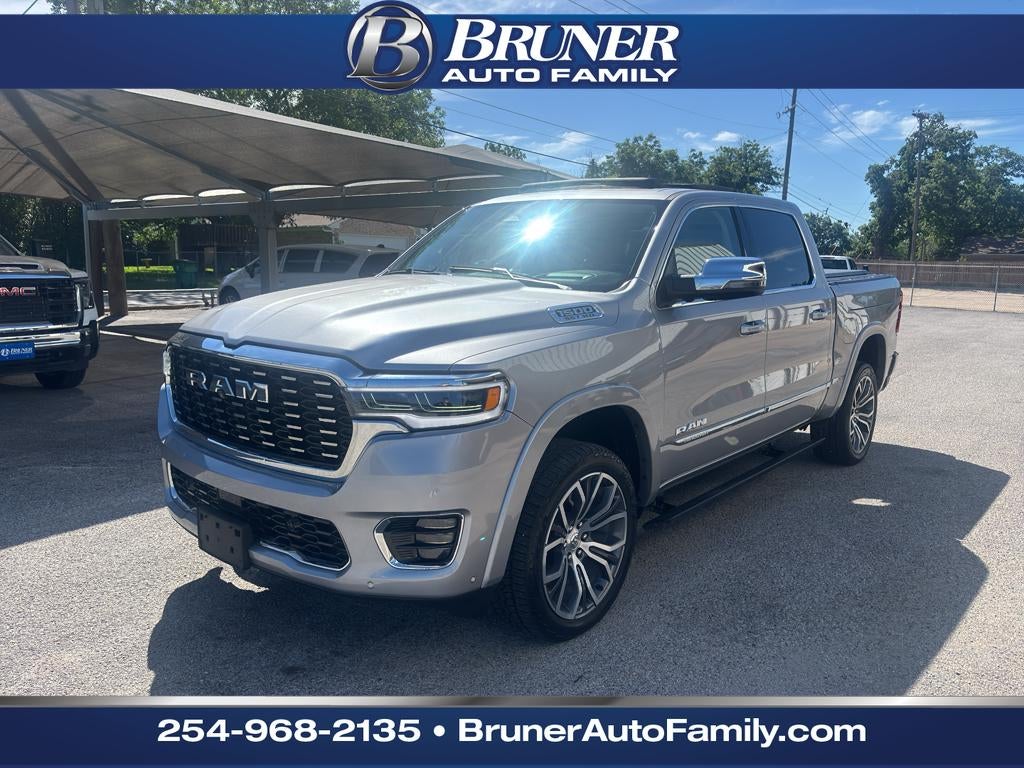 2025 RAM 1500 Tungsten Crew Cab 4x4 5'7' Box in Billet Silver Metallic Clearcoat — front three-quarter view