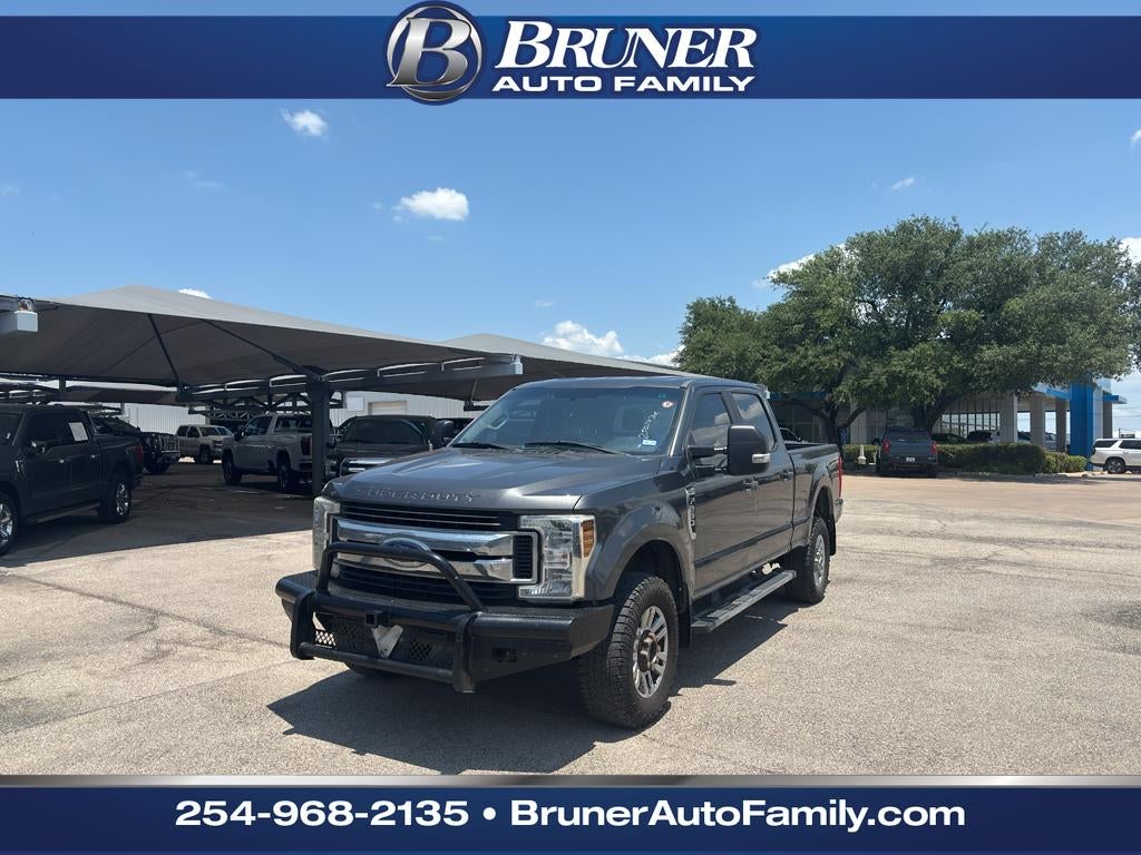 2019 Ford F-250 XL in Magnetic Metallic — front three-quarter view