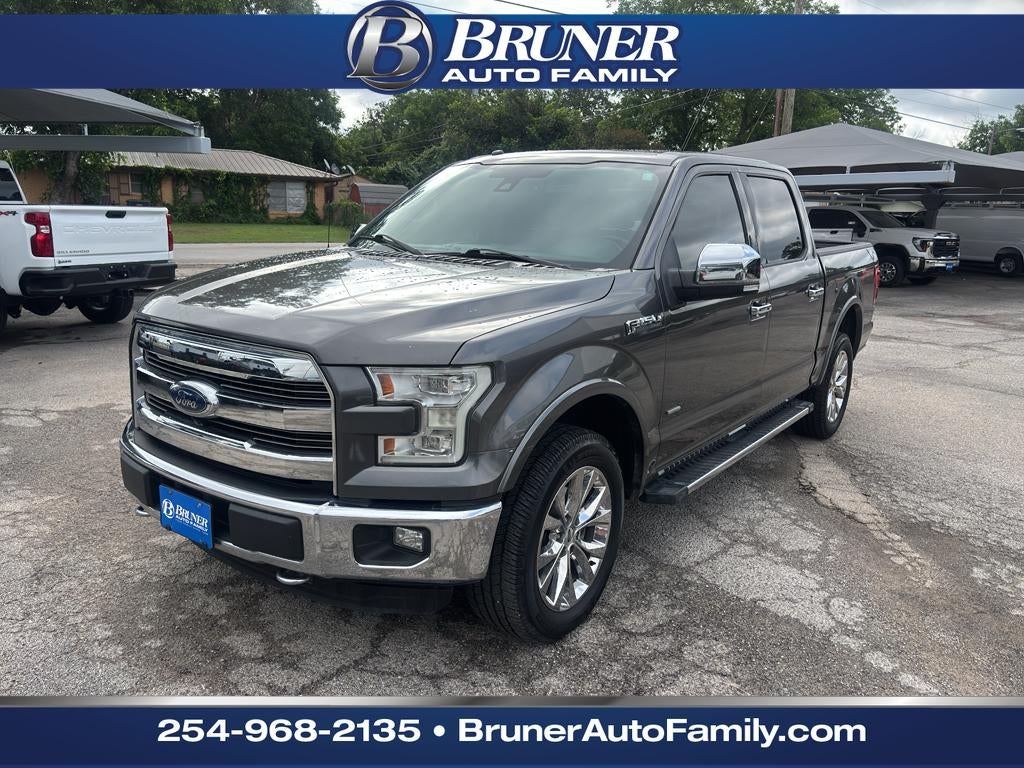 2016 Ford F-150 Lariat in Magnetic Metallic — front three-quarter view