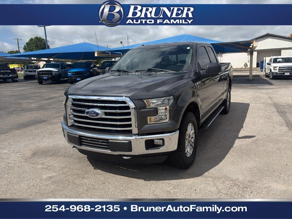 2016 Ford F-150 XLT in Magnetic Metallic — front three-quarter view