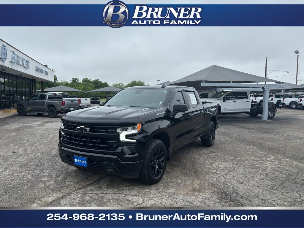 2024 Chevrolet Silverado 1500 4WD Crew Cab Short Bed RST in Black — front three-quarter view